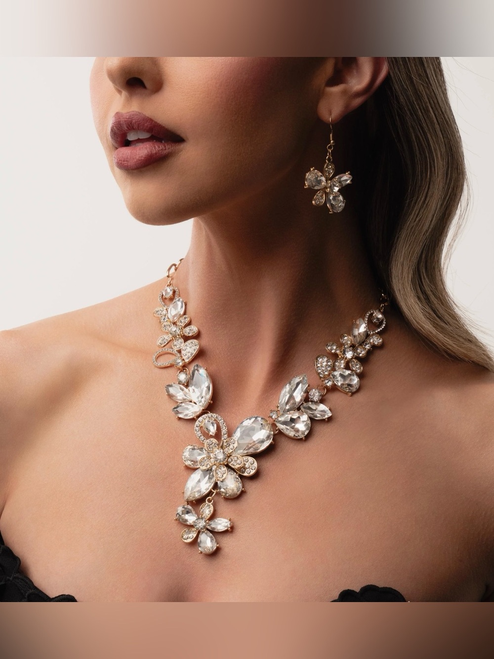 Elegant Gold Crystal Floral Statement Necklace and Earrings